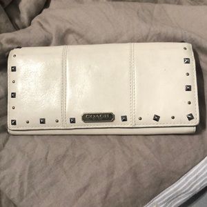 Cream colored Coach wallet